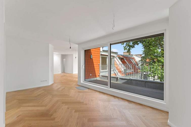 Wohnzimmer mit offener Küche