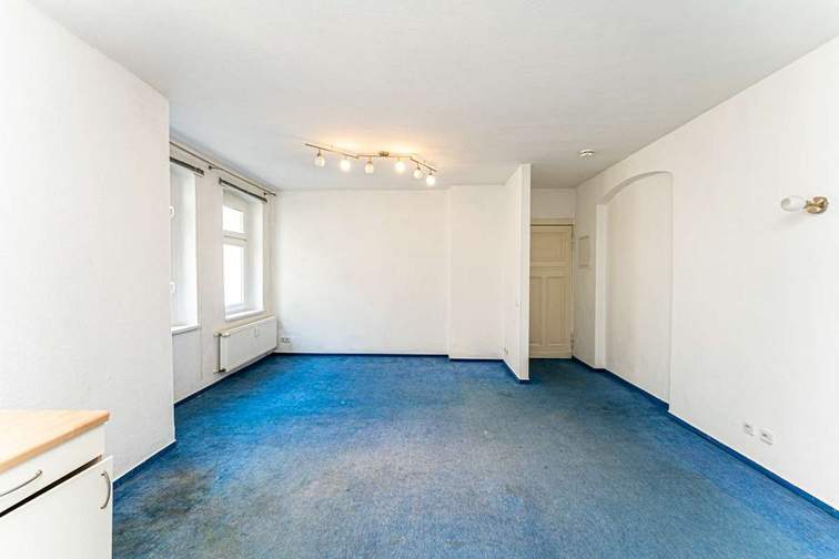Living room and fitted kitchen