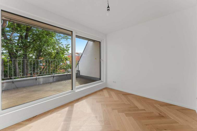 Wohnzimmer mit offener Küche