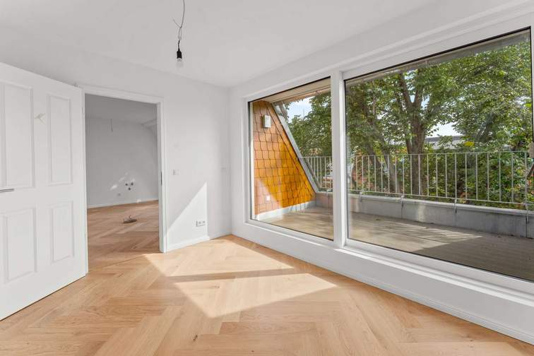 Wohnzimmer mit offener Küche
