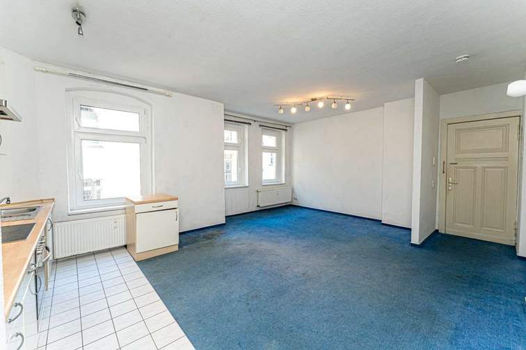 Living room and fitted kitchen