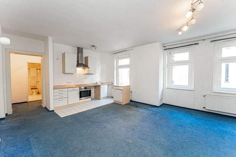 Living room and fitted kitchen