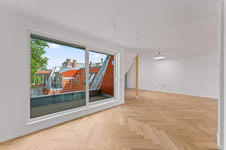 Wohnzimmer mit offener Küche
