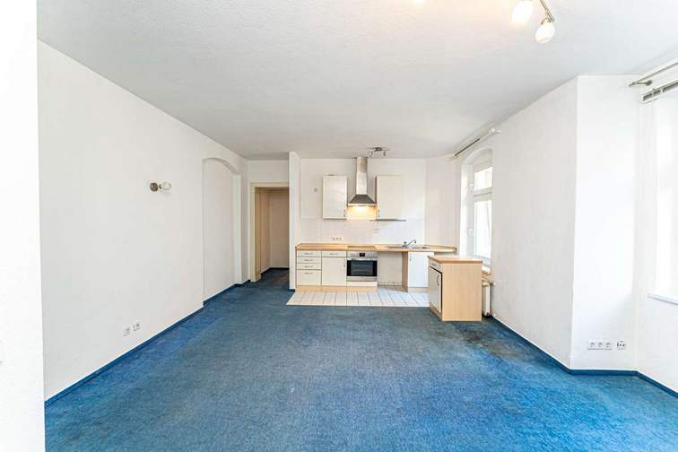 Living room and fitted kitchen